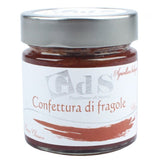 Vasetto di confettura di fragole con tanta frutta e poco zucchero, preparata con fragole tagliate a mano senza essere frullate. Prodotte in Basilicata