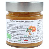 Vasetto di marmellata di arance e zenzero con scorze di arancia tagliate a mano, poco zucchero e ingredienti biologici selezionati.