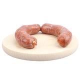 Salsiccia fresca lucana di Corleto Perticara dal colore rosato e dal profumo intenso di finocchietto e peperone, prodotta secondo le antiche tradizioni contadine della Basilicata.